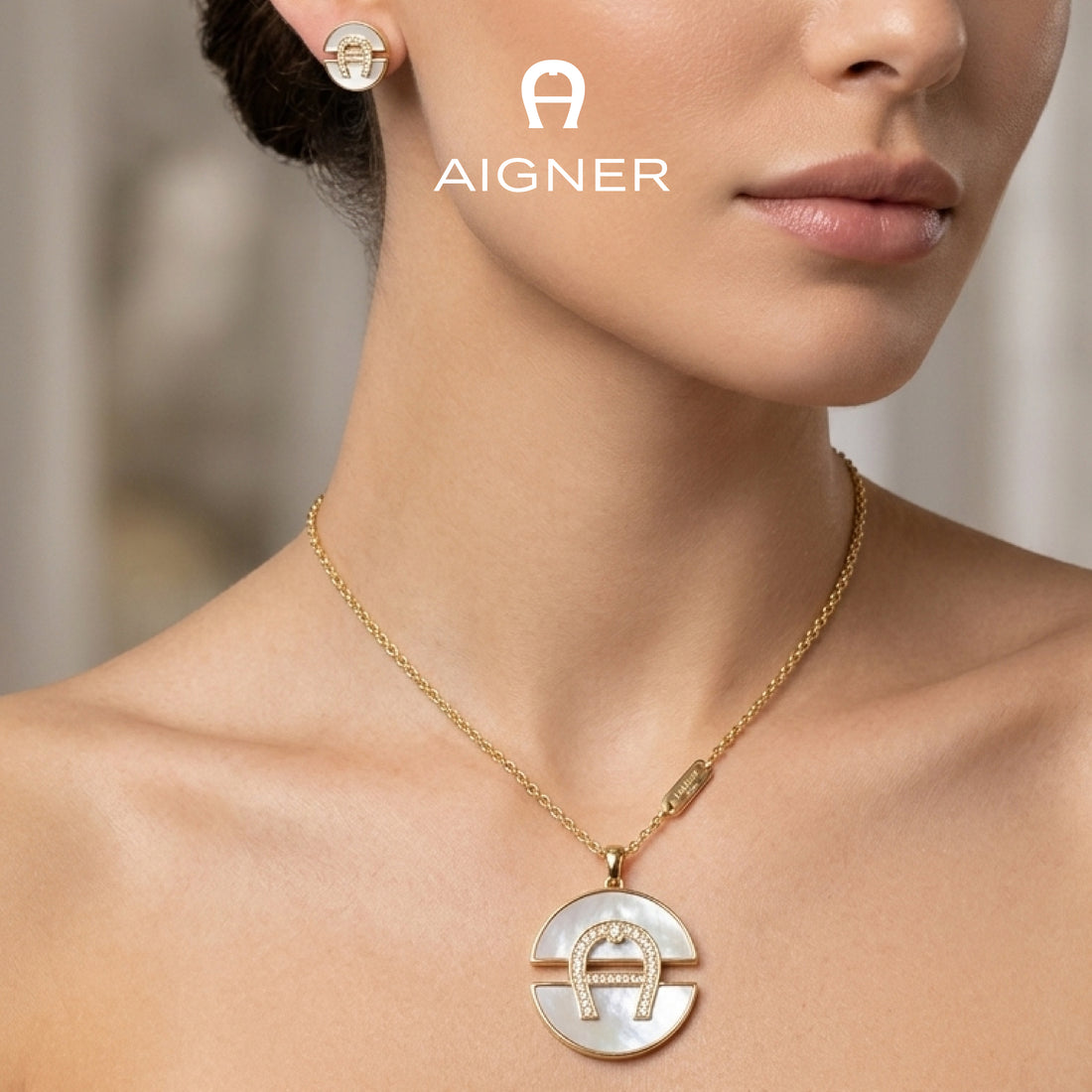 Women's Aigner Necklace & Earing Set.